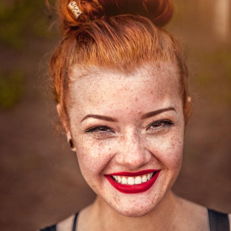 Alex Carter, Lead Design Curator at Novaver Talis, reviewing corporate floral arrangements